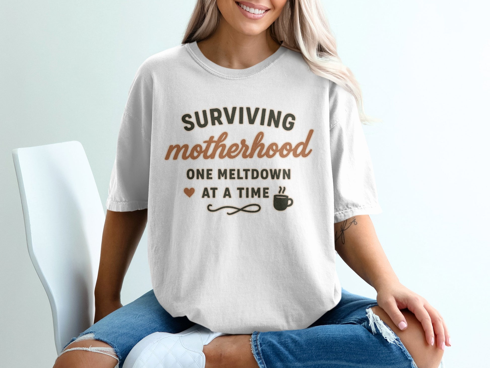 White- Surviving Motherhood One Meltdown at a Time Shirt