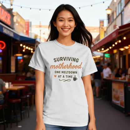 White- Surviving Motherhood One Meltdown at a Time Shirt